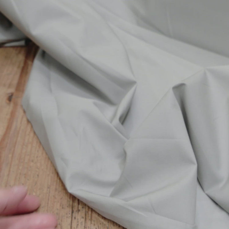 Plain grey fabric. 