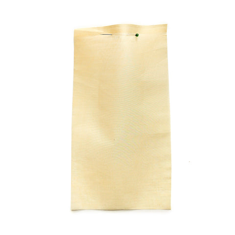Yellow cotton fabric with a paper-like texture.