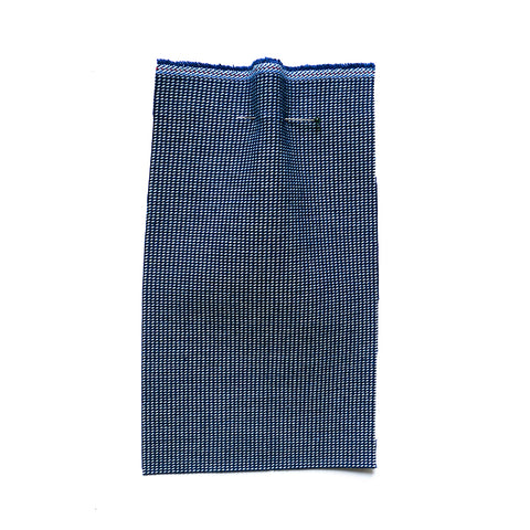 Blue cotton fabric with a white woven fleck.