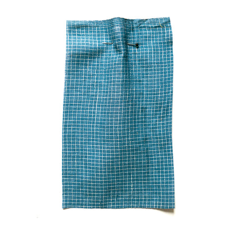 Sky blue cotton fabric with a woven white grid check.