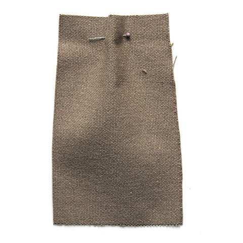 Plain taupe fabric with a canvas texture. 