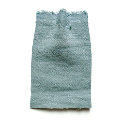 Sky blue linen fabric with a brushed texture.