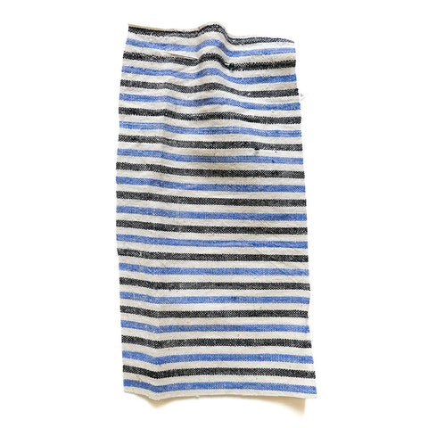 Fabric woven with cream, blue and black stripes.