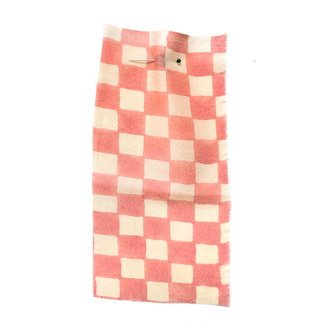 Cotton with pink and white check pattern.