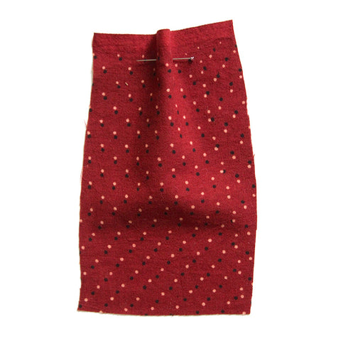 Red cotton with spots.