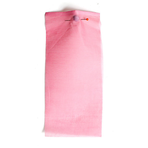 Rose pink cotton fabric, with a sheer paper-like texture.