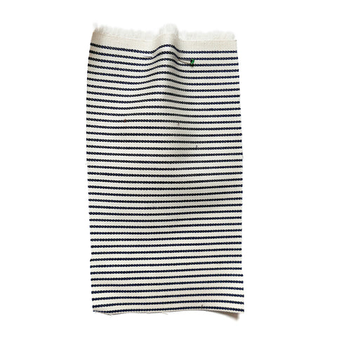 Cream denim fabric with blue stripes.