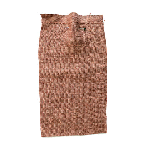 Brown fabric with a slubby texture.