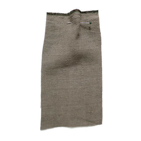 Grey fabric with a linen-like texture.