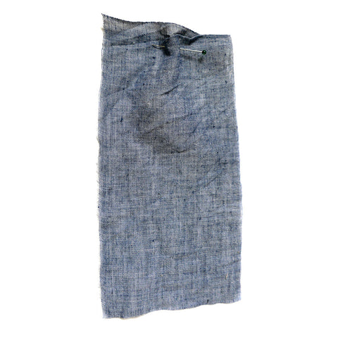Dark Blue chambray fabric with a washed and crumpled texture.