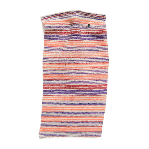 Striped cotton in peach and purple, with a linen-like texture. 