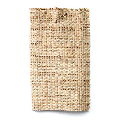 Natural coloured straw woven into fabric.