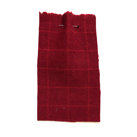 Red fabric with a wooly texture and a faint red check.