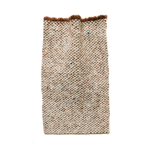 Brown and cream wool fabric with a flecked texture. 