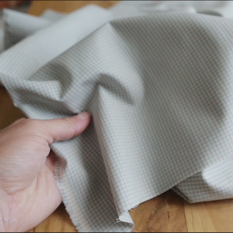 Light blue and cream gingham fabric. 